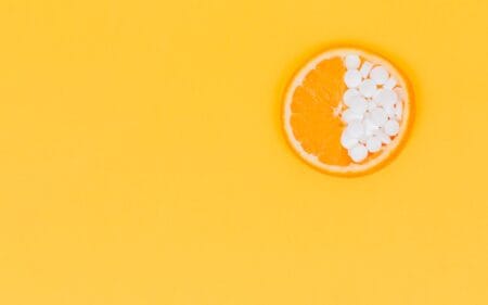 orange fruit with white round fruits